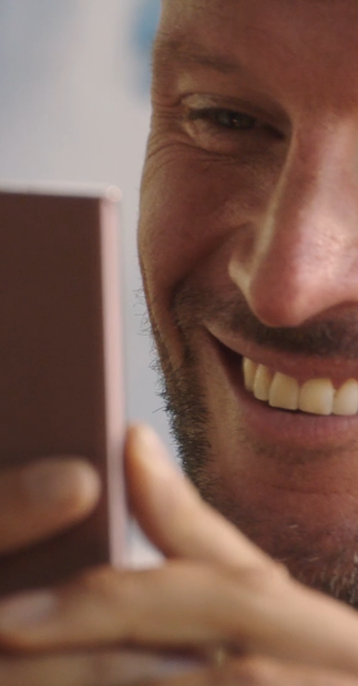 Audience member watching vertical video on a phone